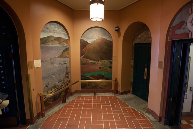 An oil painting by Otis Oldfield covers the walls in the elevator foyer (Mark Andrew Boyer / KQED)