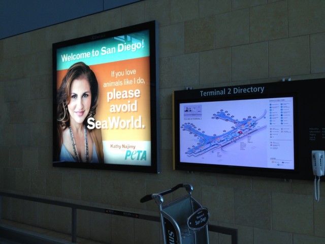 Airport advertisement from People for the Ethical Treatment of Animals urging San Diego airport patrons to avoid SeaWorld. (PETA photo)