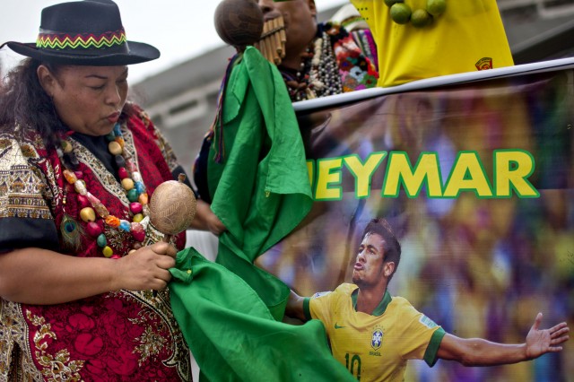 Peruvian shamans perform a ritual of predictions for the FIFA World Cup Brazil 2014 in front of the National Stadium of Peru (Ernesto Benavides/Getty Images)