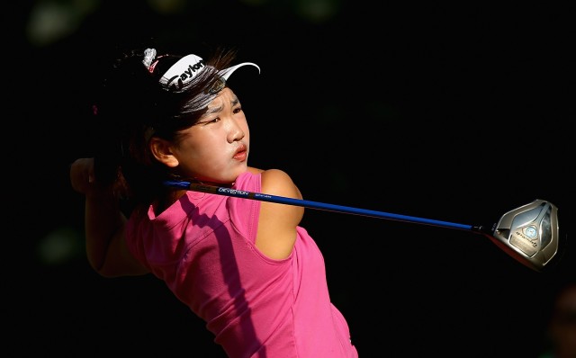 Peninsula sixth-grader Lucy Li watches a shot during a practice round prior to the start of the 69th U.S. Women's Open. (Streeter Lecka/Getty Images)