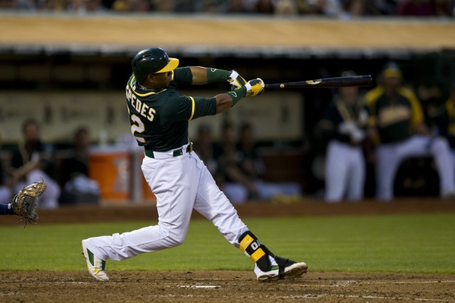 A's outfielder Yoenis Cespedes, traded to the Boston Red Sox on Thursday. (Jason O. Watson/Getty Images)