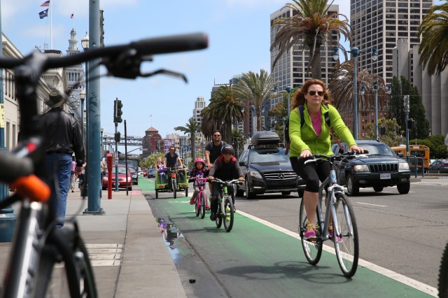 The Embarcadero attracts many bicyclists, as well as cars and pedstrians. (Jeremy Raff/KQED)