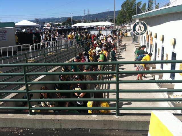 Fans stand in line to buy A's tickets at the Oakland Coliseum. (Nina Thorsen/KQED)