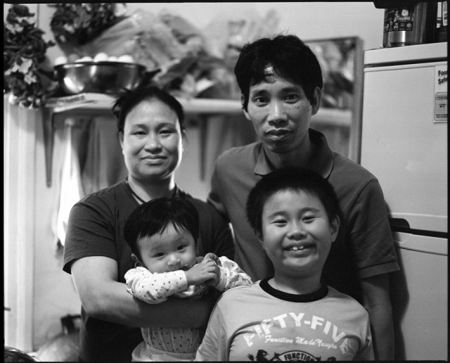 Family living in a residential hotel in Chinatown, San Francisco. (James Hosking and Jeremy Lybarger/The Bold Italic)