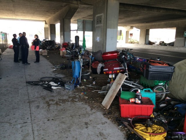 Berkeley police have been visiting the homeless camp on Gilman Street — pictured here in early July — to provide outreach.  (Drew Jaffe/Berkeleyside)