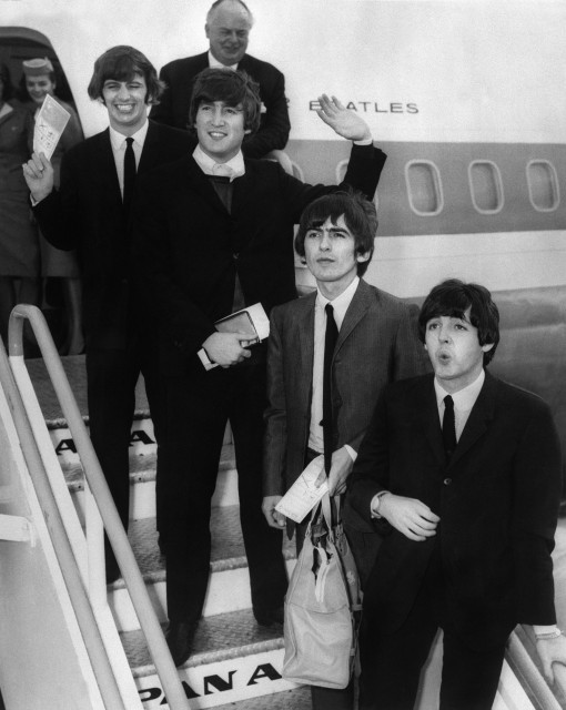 The Beatles leave London for their U.S. tour in 1964. The band opened the tour at Cow Palace in San Francisco. (AFP/Getty Images)