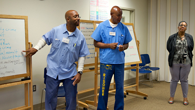 Inmates trained as mentors lead classes as part of the Long-Term Offender Pilot Program at Solano State Prison. (Monica Lam/KQED)