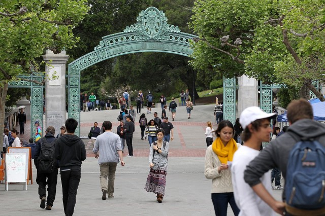 UC Berkeley students walk through Sproul Plaza on the UC Berkeley campus in April 2012. (Photo by Justin Sullivan/Getty Images)