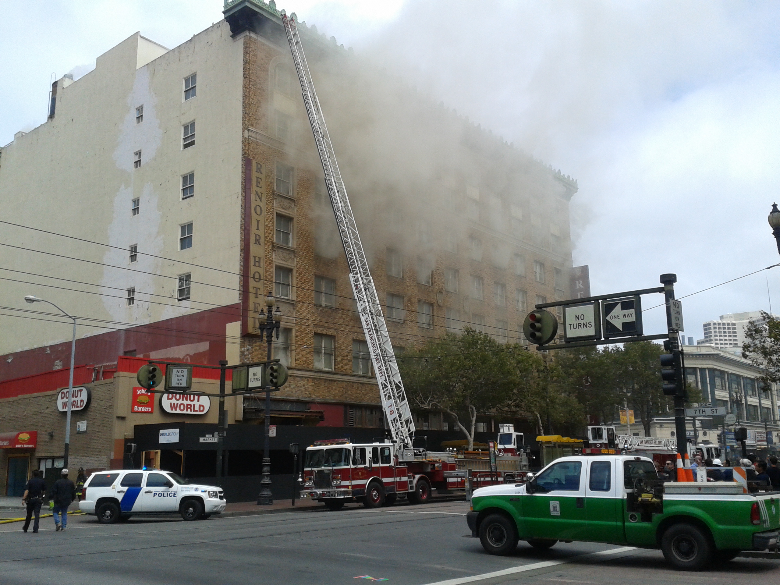 A three-alarm fire Monday damaged the shuttered Renoir Hotel in San Francisco's Mid-Market area. (Scott Morris/Bay City News)