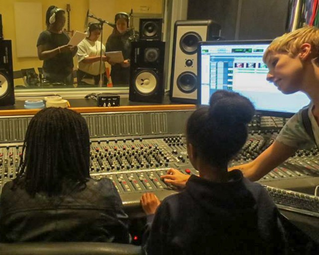 An instructional session in a control room at San Francisco's Women's Audio Mission. (Courtesy Women's Audio Mission)