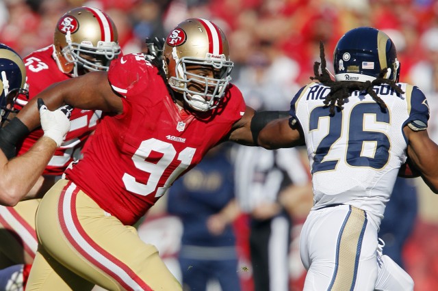 San Francisco 49ers defensive tackle Ray McDonald, wearing No. 91, in action in 2012. (Brian Bahr/Getty Images)