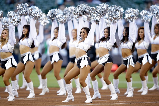 The Raiderettes, the Oakland Raiders cheerleaders, perform during the Oakland Raiders preseason game against the Detroit Lions at O.co Coliseum on August 15, 2014 in Oakland, California. (Ezra Shaw/Getty Images)