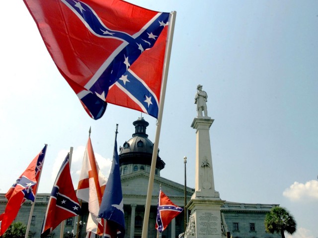 The Confederate battle flag waves at a 2000 protest at the South Carolina state Capitol in Columbia. (Erik Perel/AFP)