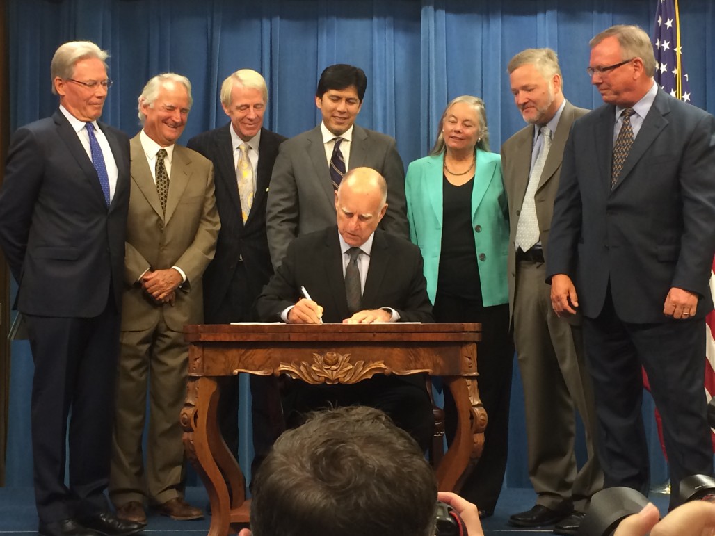 Gov. Jerry Brown signs new state laws regulating the use of groundwater.  (Photo: John Myers/KQED)