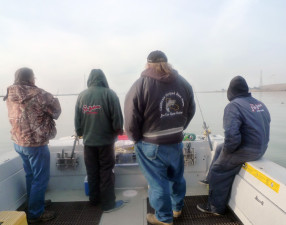Fishermen wait for bites onboard Barry Canavero's boat, "Fishing Fool IV." (Lisa Morehouse/KQED)
