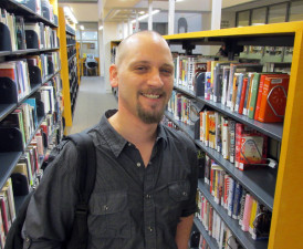Joe Bank was homeless until he was helped by the San Francisco Public Library's social worker. Now he works for the library as a homeless outreach worker. (Scott Shafer/KQED)