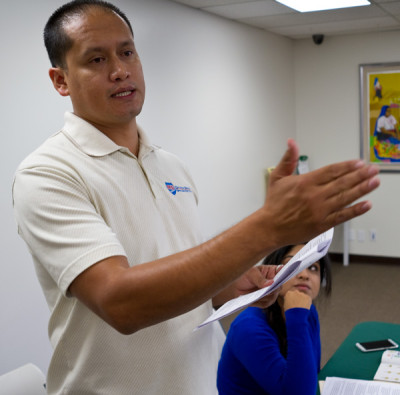 This is the fourth class driver's ed teacher Juan Carlos Lopez has taught for undocumented immigrants this year. Lopez, who drove without a license for many years as a formerly undocumented immigrant, says he failed his written driver's exam the first two times he took it. ( Marcus Teply/KQED)