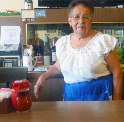 Waitress Lucy Reyes started working at Mitla Cafe in 1951. (Lisa Morehouse/KQED)