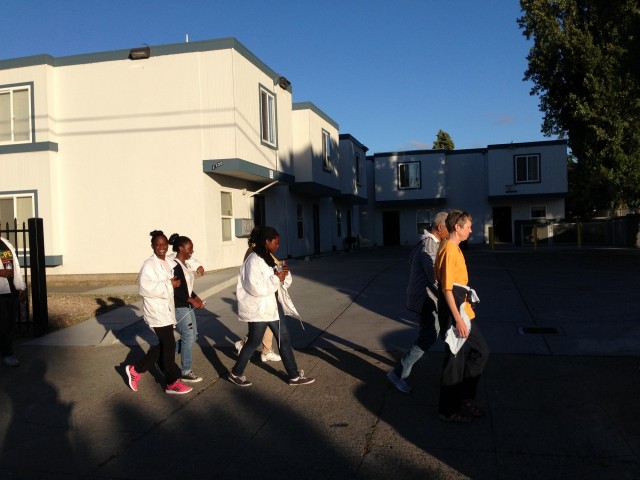 A peace march goes through East Oakland every Friday evening. (Cyrus Musiker/KQED)