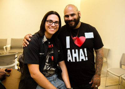 Joseph Ortiz and his AHA mentor Martin Leyva hang out backstage before the Sing It Out show. (Noah Dalton Schneider/KQED)