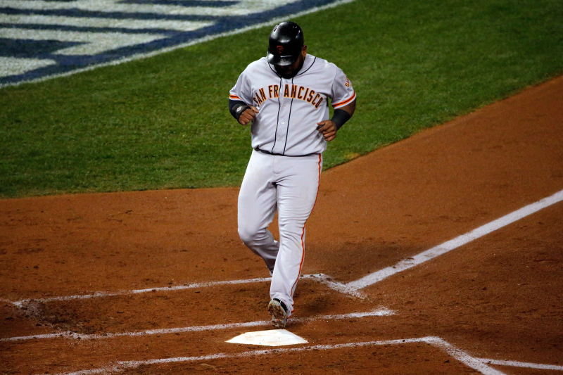 Pablo Sandoval #48 of the San Francisco Giants scores in the second inning against the Kansas City Royals during Game Seven of the 2014 World Series. (Doug Pensinger/Getty Images)