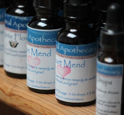 Swiecicki has been creating herbal formulas for about ten years. One of her products, Heart Mend, contains mimosa, lemon balm, red roses, and other herbs. (Sara Bernard/KQED)