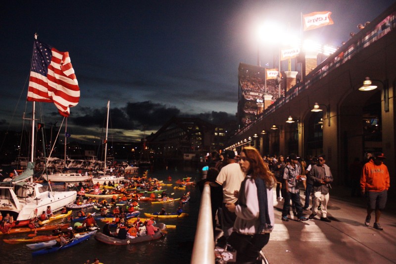 Fans gather outside McCovey Cove to watch game three of the World Series. (James Tensuan/KQED)