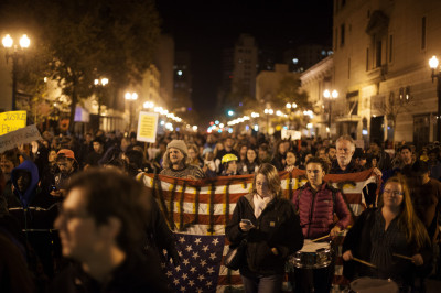 About an hour after the grand jury decision was announced, the protest ballooned in size, as demonstrators marched north on Broadway. (Mark Andrew Boyer/KQED)