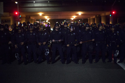 Early in the evening, protesters marched to the Nimitz Freeway, where they faced off with Oakland Police. (Mark Andrew Boyer/KQED)