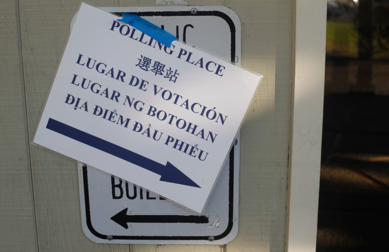 A sign signals voters to a polling place at 660 Bellevue Avenue in Oakland. (Katie Brigham/KQED)