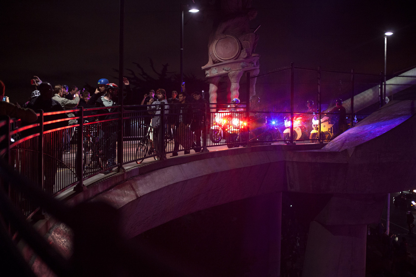 Stand off between protesters and police on I-80 pedestrian overpass. (Mark Andrew Boyer)