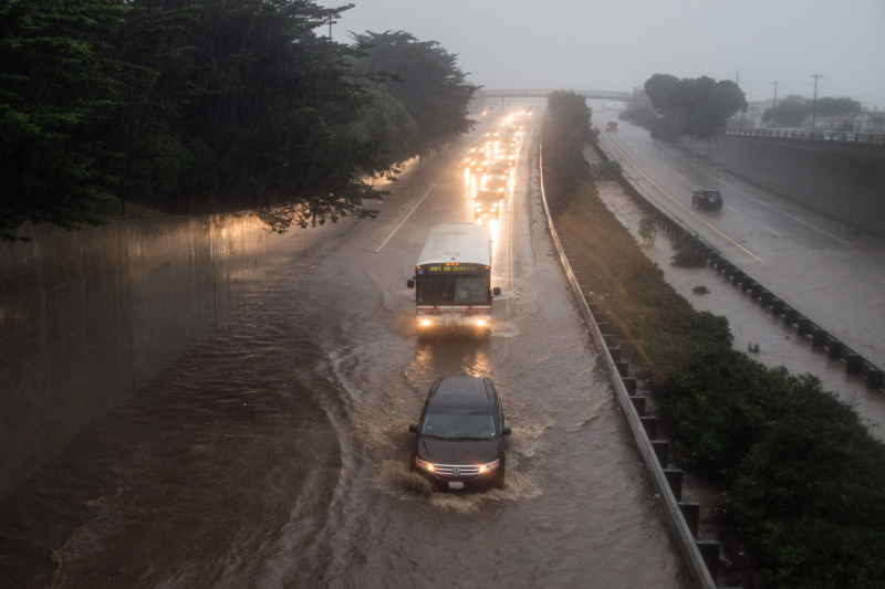 Flooding of Highway 1 at the Manor Drive overpass in Pacifica (Steve Byrne/KQED)