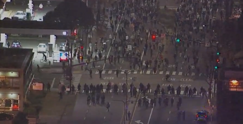 Police line at 6th St. and University Ave.