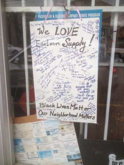 After protesters broke windows at True Value Eastern Supply at 2900 Shattuck Ave., neighbors made this sign in support of the hardware store. (Natalie Orenstein/Berkeleyside)
