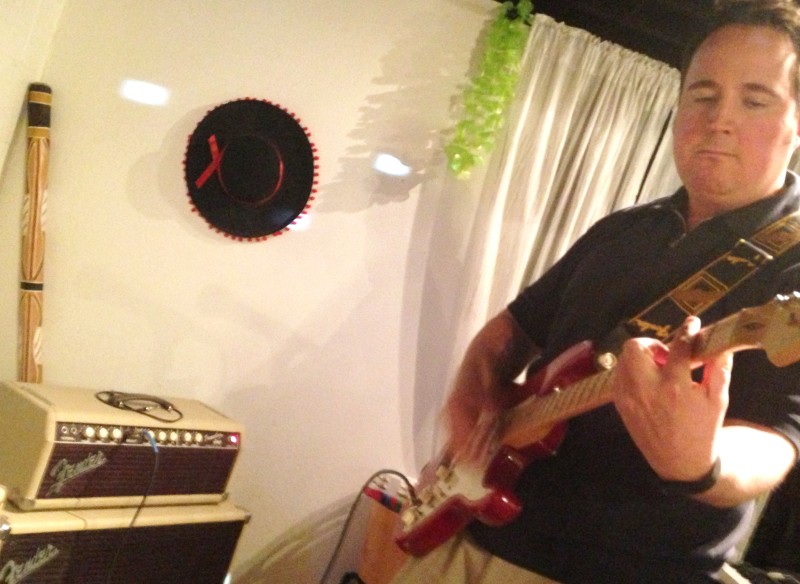 Riverside dentist Mark Harris plays on some treasured Fender gear in his basement rehearsal space.