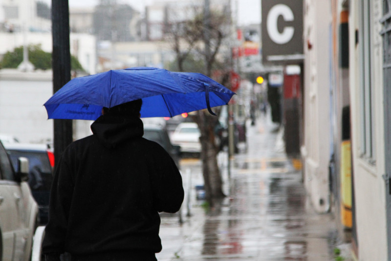 The Bay Area is expecting a windy storm early in February. Rain began to fall Friday morning in San Francisco's Mission District. (Anya Schultz/KQED)