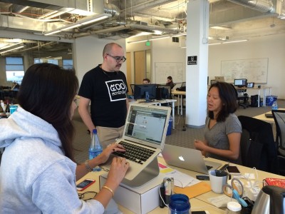 Dave McClure, founding partner of the tech incubator 500 Startups talks with staff members after a new batch of entrepreneurs arrive in his San Francisco office. 500 Startups has offices in Mountain View, San Francisco and Mexico City.