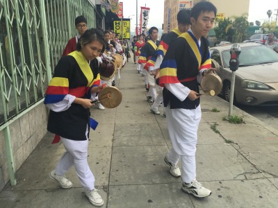 As they march, the drummers shout, “Ajulshigoo-johta!” – it’s basically a vocal high-five.