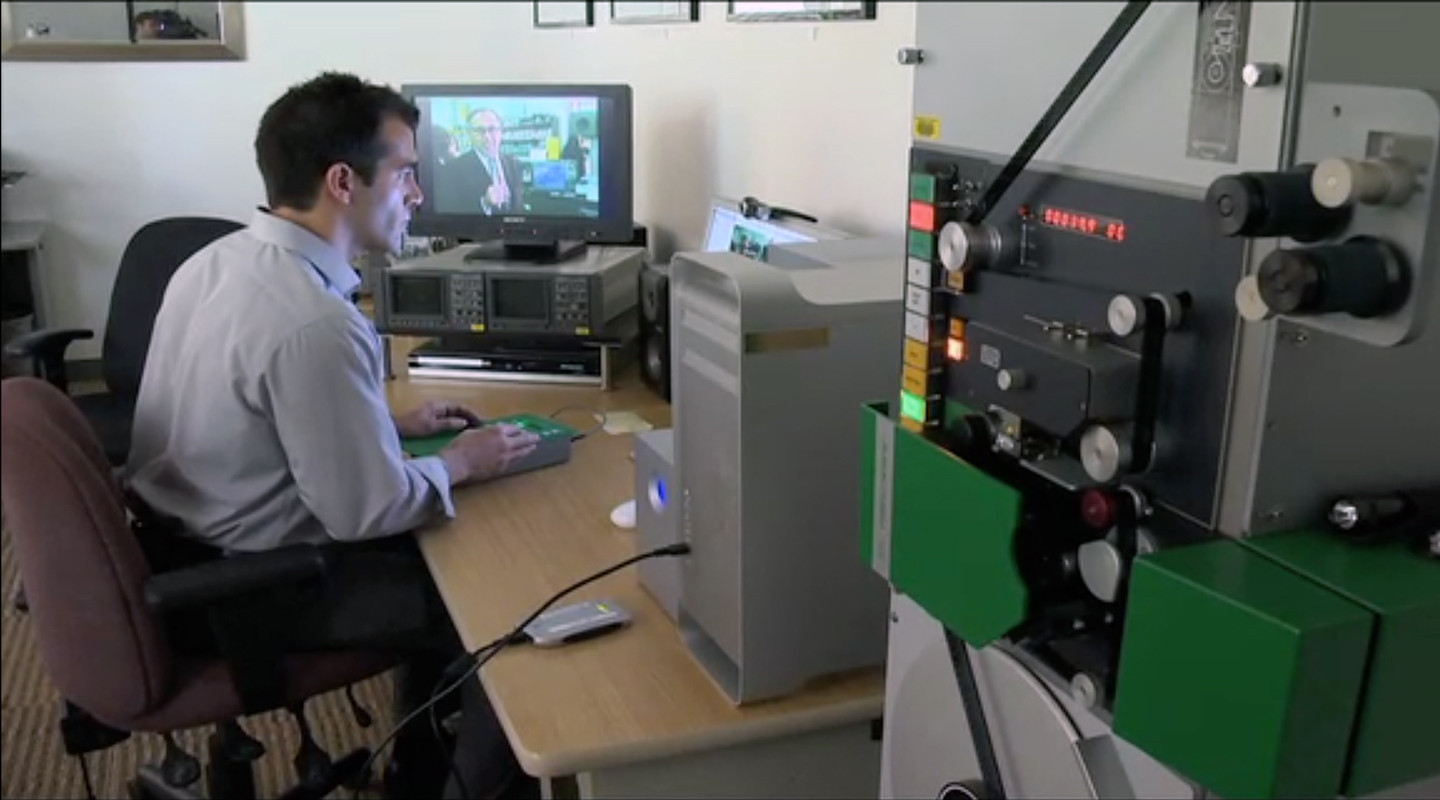 SF State film archivist Alex Cherian pictured in a 2011 short film produced by KPIX. (SF Bay Area TV Archive)