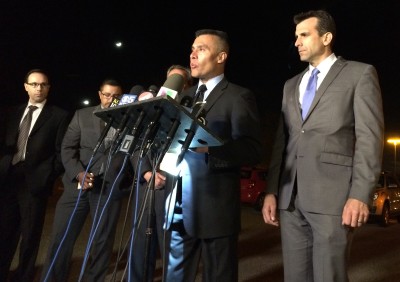 San Jose Police Chief Larry Esquivel, center, and Mayor Sam Liccardo, right, at Tuesday night press conference on fatal shooting of police officer. 