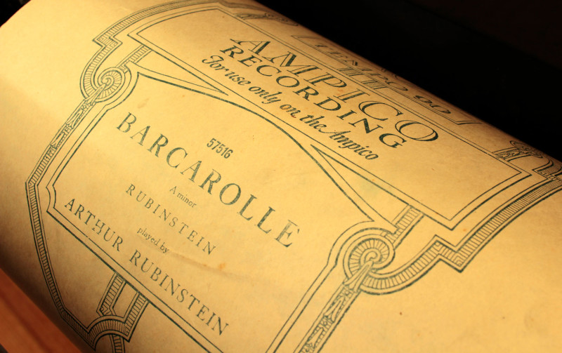 A player piano roll containing the touch and timing of a performance by Arthur Rubinstein.