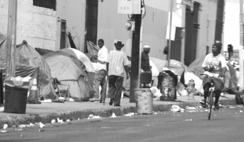 A Skid Row sidewalk encampment at the southern edge of Skid Row, home to the city’s warehouse and art district.  