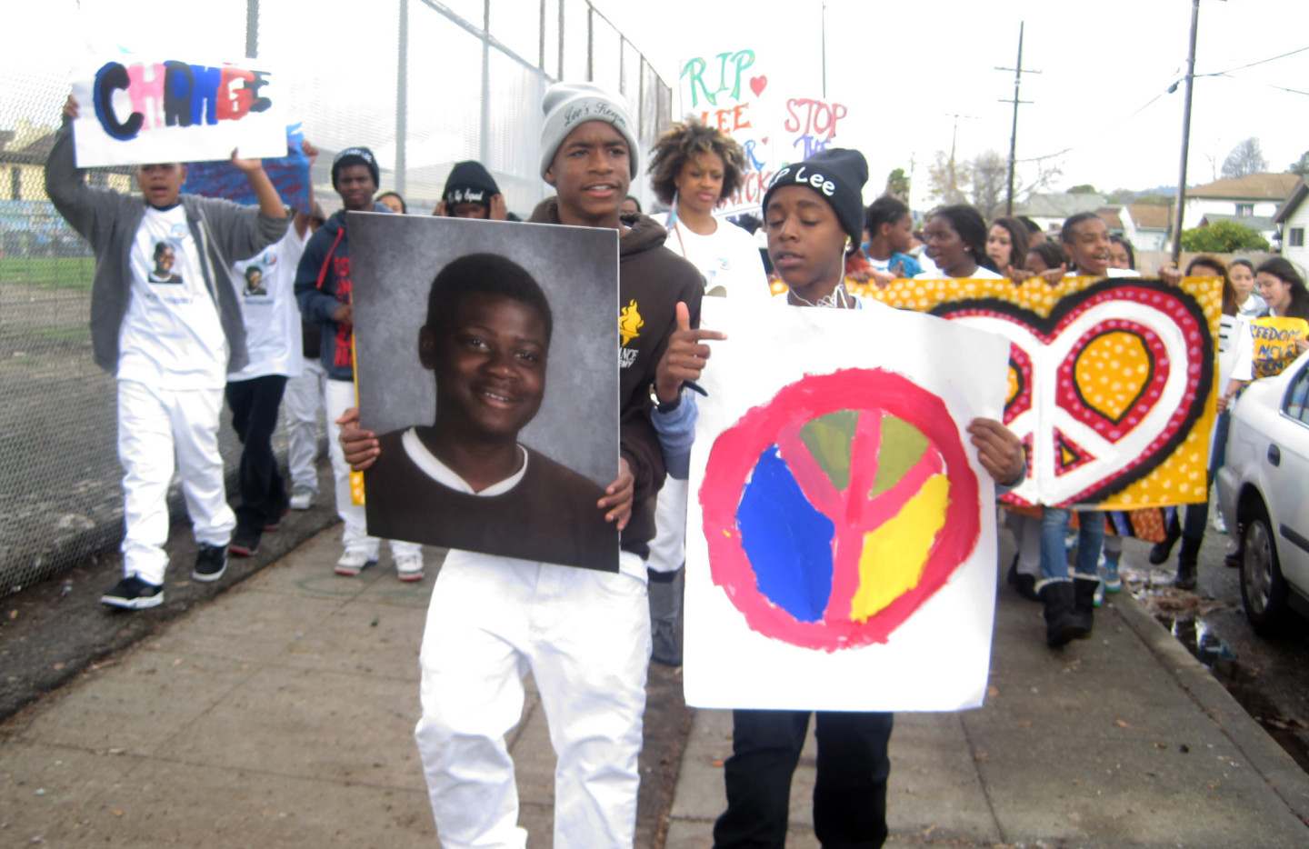 February 2014-- Students of Alliance Academy, including Diamond Allen (far left), marched to remember classmate Lee Weathersby III, who was shot and killed in Oakland. (Zaidee Stavely/KQED)
