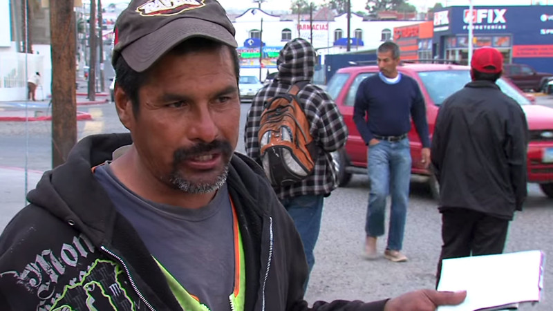Cesar Jimenez Sanchez has waited daily at this corner outside a Costco in Tijuana for the past five years, hoping to pick up odd jobs. He was deported following a DUI arrest, leaving behind a wife and eight children in the U.S.