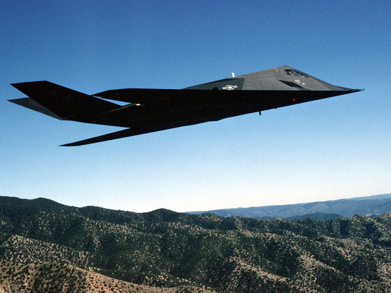 In this undated handout photo, the F-117A Nighthawk stealth fighter — from the 49th Fighter Wing, 9th Fighter Squadron — flies during a training mission over the New Mexico desert.