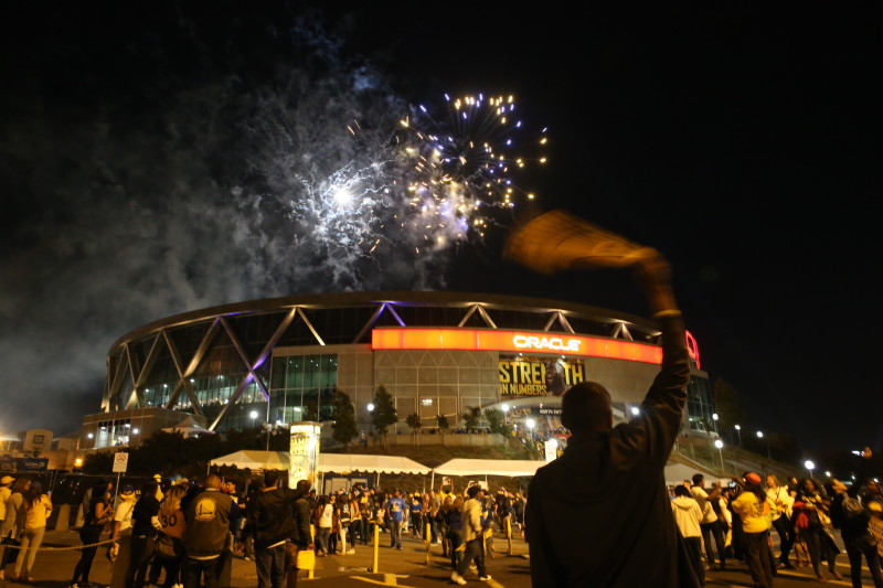 Golden State Warriors fans celebrate their team's 2015 NBA Finals win in front of Oracle Arena on June 16, 2015 in Oakland, California.  (Justin Sullivan/Getty)