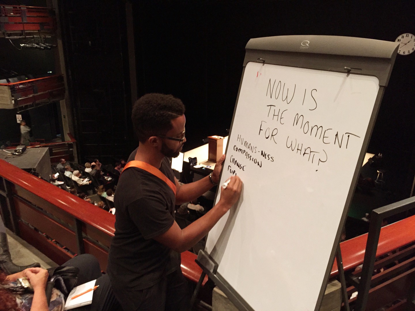 Poet Dahlak Brathwaite at the whiteboard during Anna Deveare Smith's "Notes from the Field: Doing Time in Education, The California Chapter.”