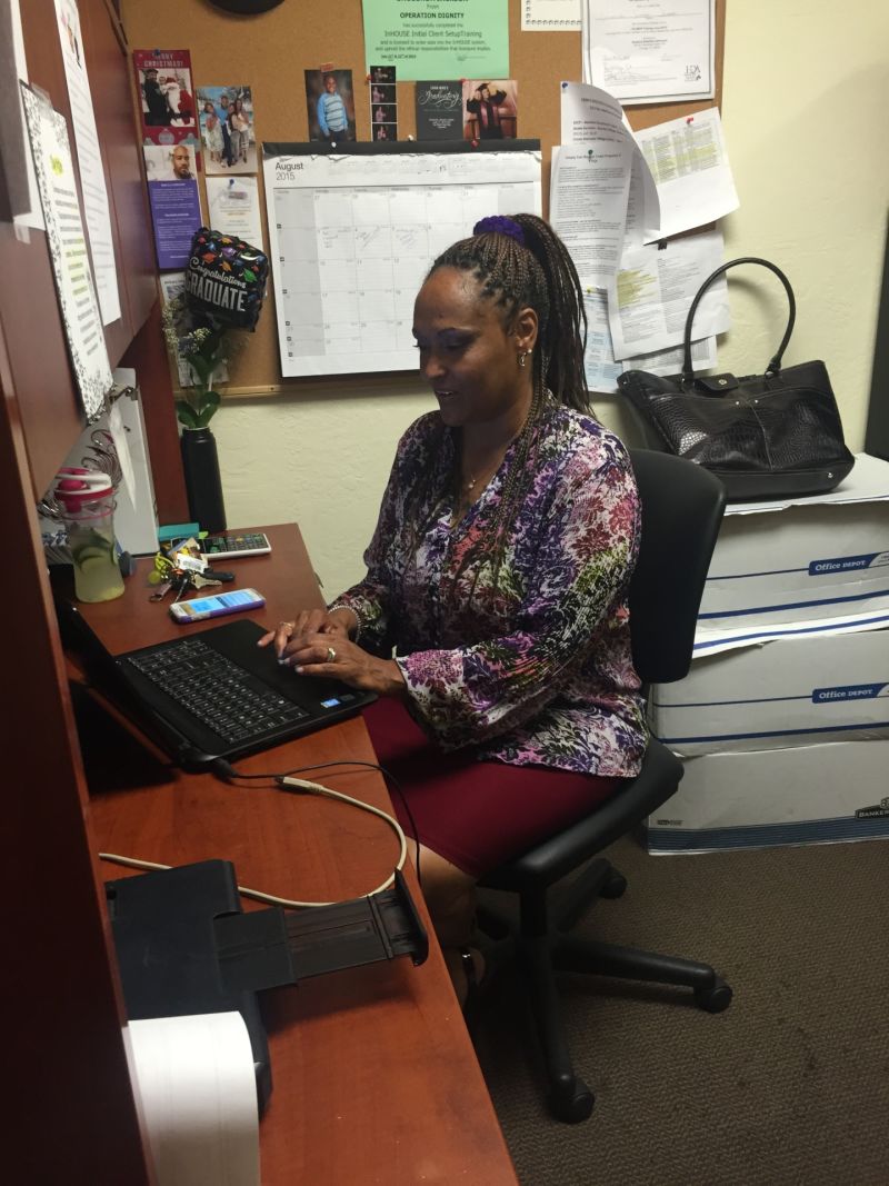 Sholonda Jackson sits at her desk in Oakland. 