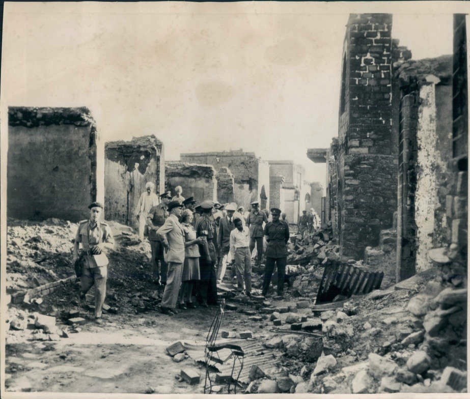 British officials visit a scene from the Punjab riots. The province of Punjab was split in two during partition and in the aftermath had some of the most violent riots.