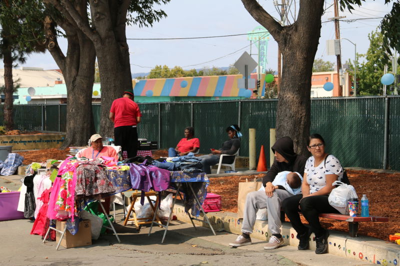 For one day only, community residents have opened their neighborhood park, closed for 13 years, for a garage sale.
